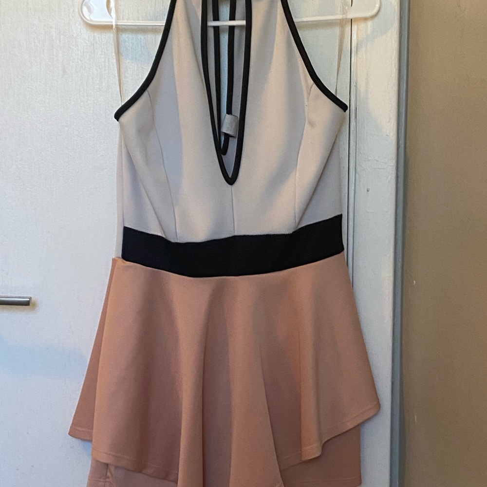 Pink and white romper by Privy Privately Privileged. Size Large